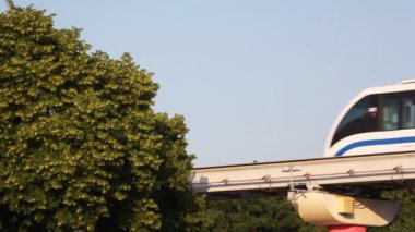 MOSCOW, RUSSIA - JUNE 22: Monorail train goes against the trees June 22, 2009 in Moscow, Russia. On November, 20th 2004 the first public monorail road in Moscow is opened